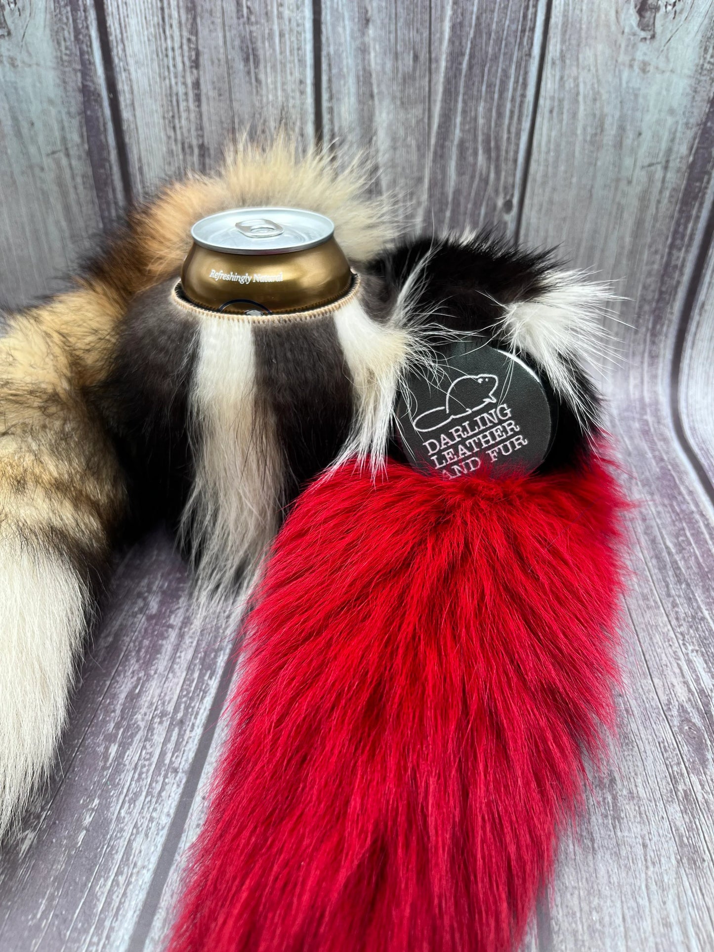 Skunk fur can cooler with Fox tail