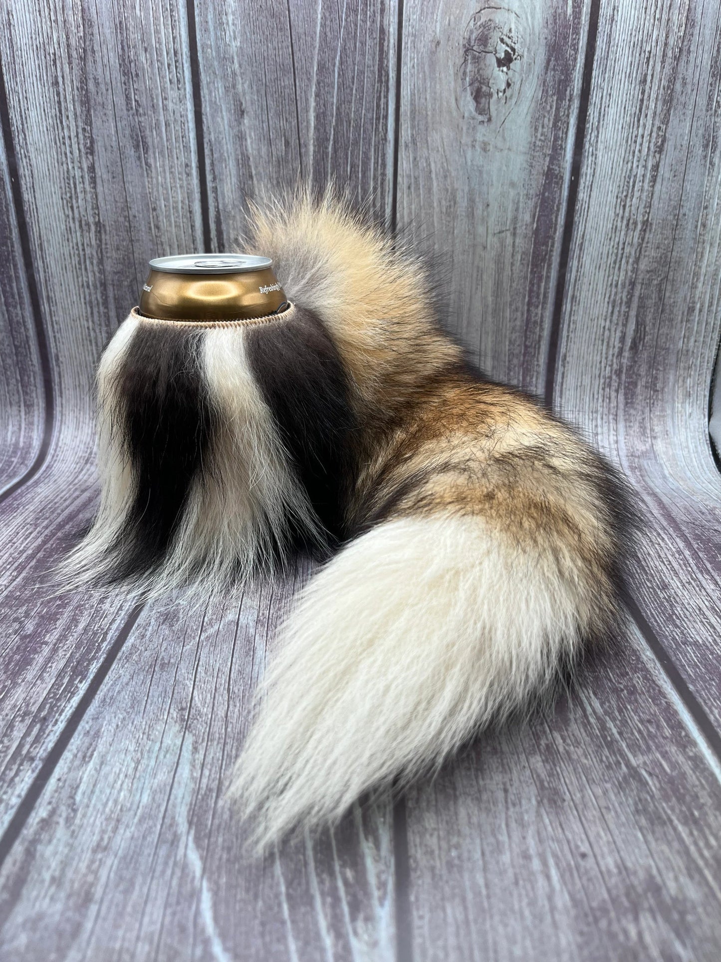 Skunk fur can cooler with Fox tail