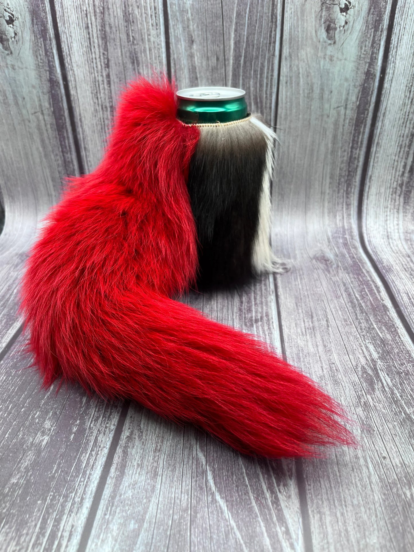 Skunk fur can cooler with Fox tail