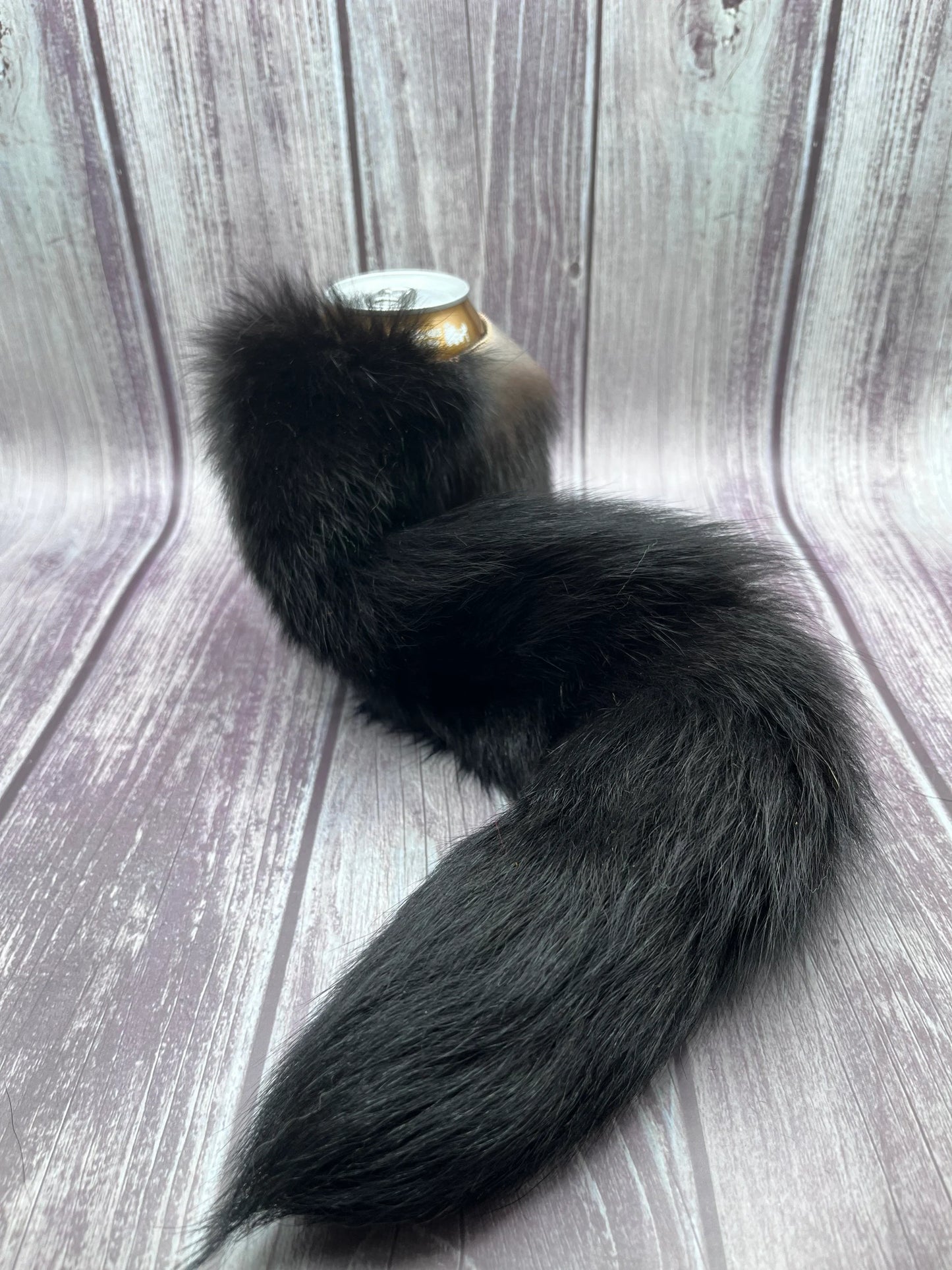 Skunk fur can cooler with Fox tail