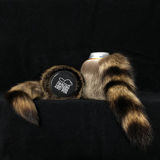 Raccoonzie. Raccoon can cooler coozie with tail.